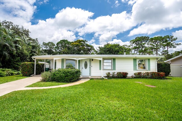 ranch-style house with a front yard