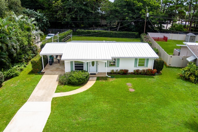 single story home with a front yard