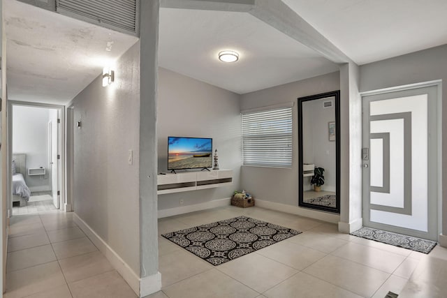 5278 NE 19th Ter, Pompano Beach, FL 33064 - foyer entrance with tile patterned floors and baseboards