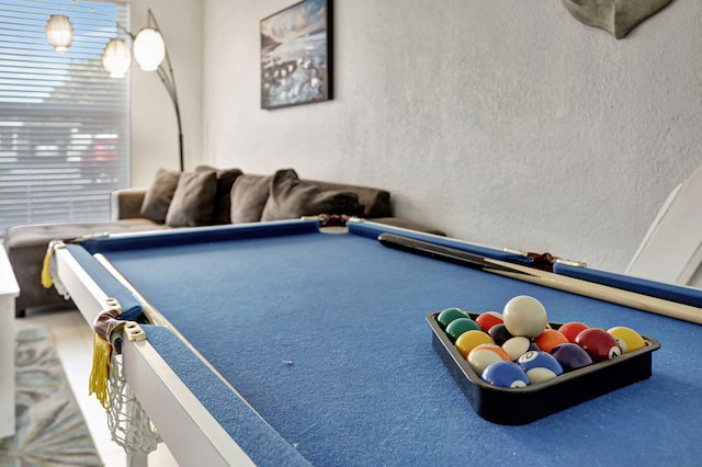 playroom with pool table and carpet floors