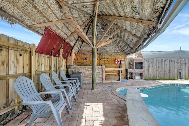 exterior space with a gazebo and a fenced in pool