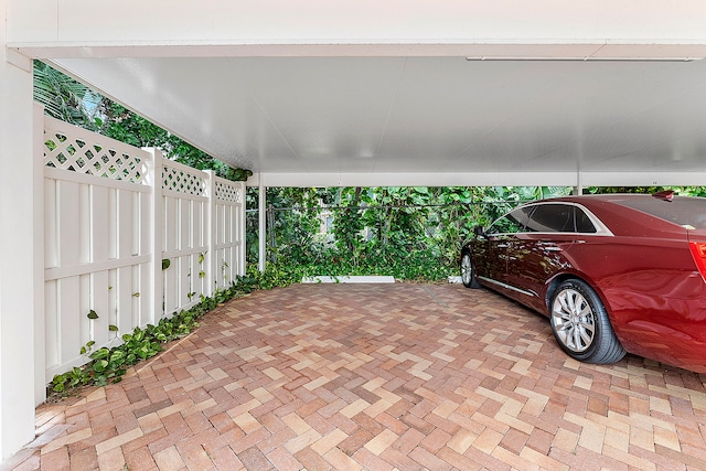 exterior space featuring a carport