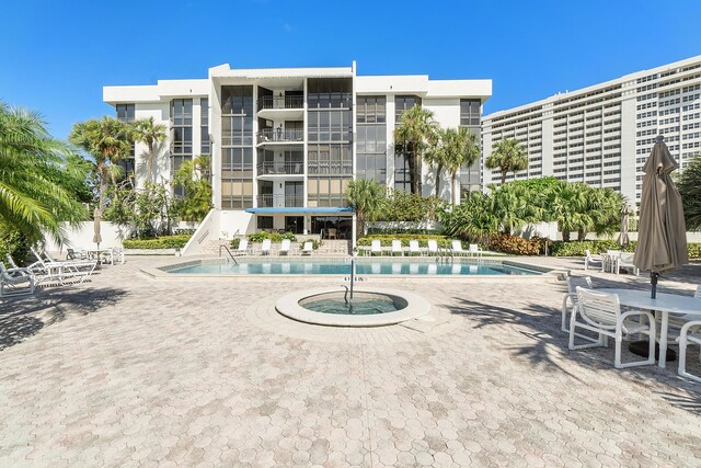 view of swimming pool with a patio area