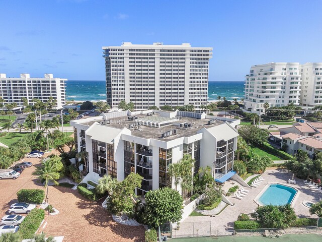 birds eye view of property featuring a water view