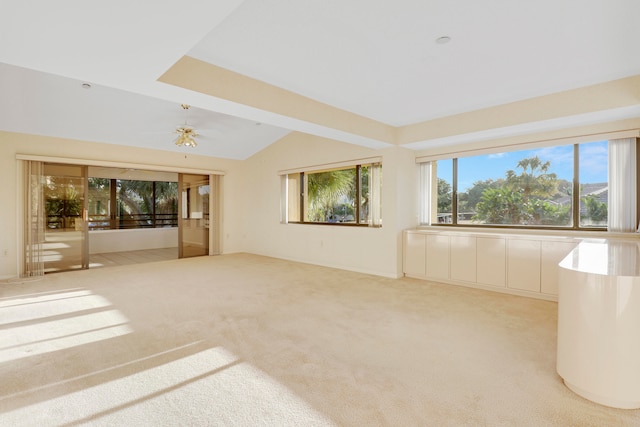 interior space with light carpet and ceiling fan