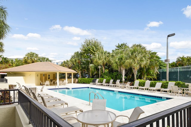 view of swimming pool featuring a patio