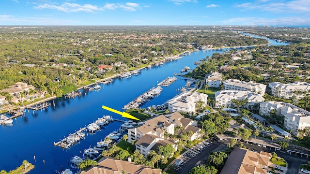 drone / aerial view featuring a water view