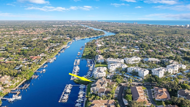 drone / aerial view featuring a water view