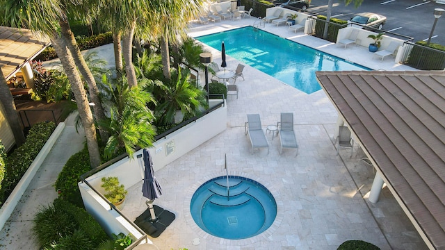 view of swimming pool featuring a patio