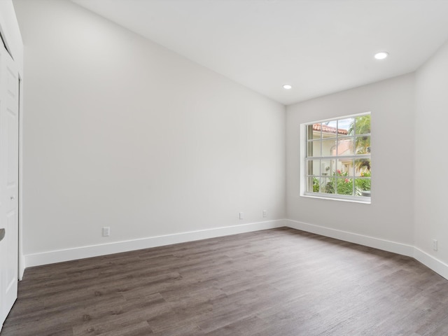 unfurnished room featuring wood-type flooring