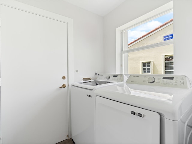 laundry area featuring washing machine and dryer