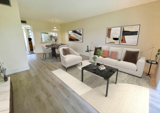 living room with light hardwood / wood-style floors