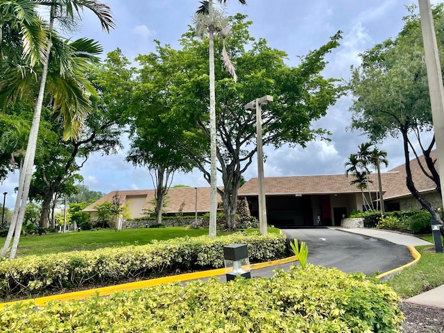 view of front of home with a carport