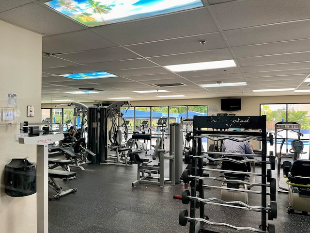 workout area with a drop ceiling