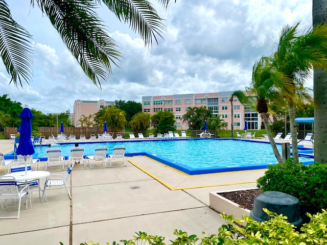 view of swimming pool featuring a patio