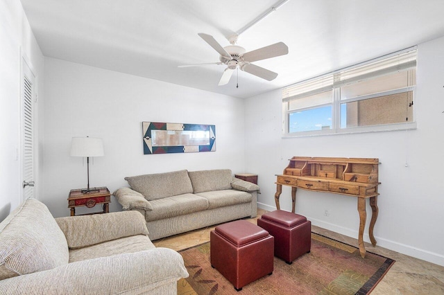 living room with ceiling fan