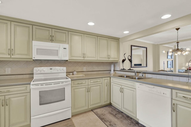 kitchen with white appliances, light tile patterned floors, an inviting chandelier, decorative backsplash, and sink