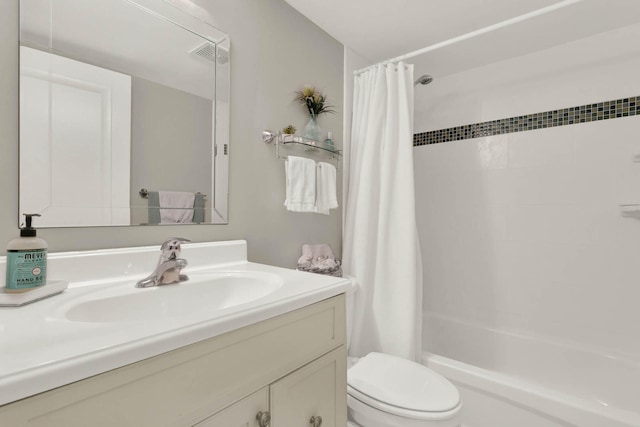 full bathroom with vanity, toilet, and shower / bath combination with curtain