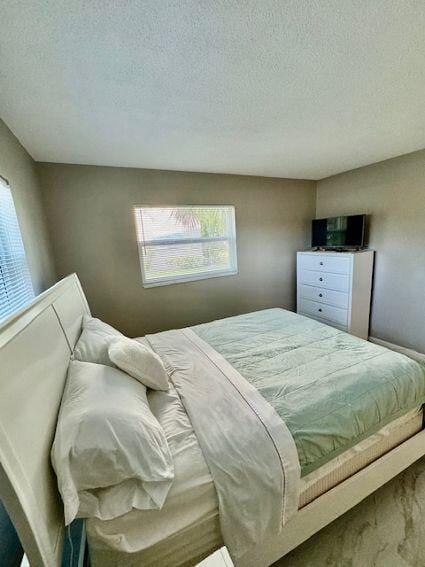 bedroom with a textured ceiling