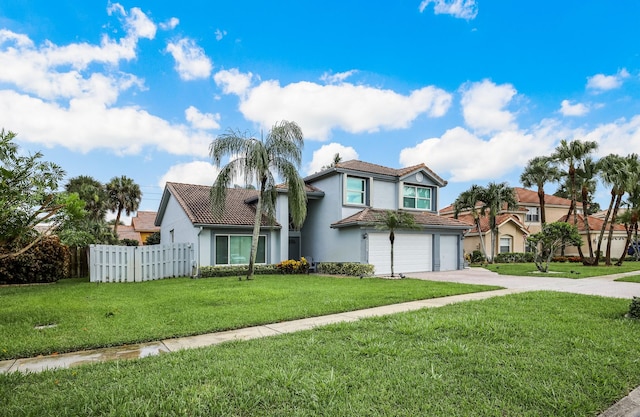 view of front of property with a front lawn and a garage