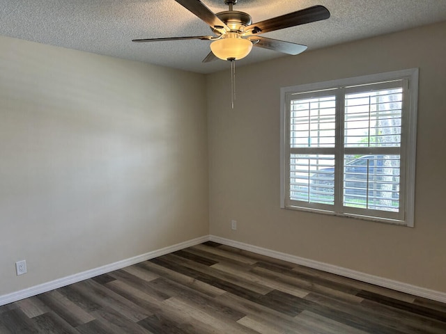 unfurnished room featuring dark hardwood / wood-style flooring, a textured ceiling, and ceiling fan