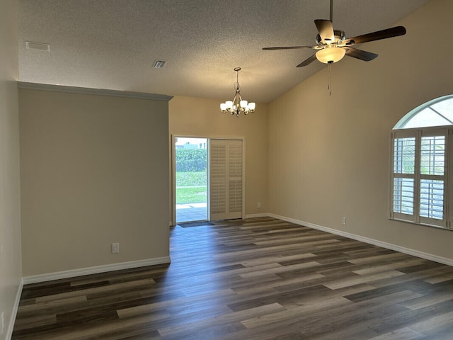 spare room featuring high vaulted ceiling, dark wood-type flooring, a textured ceiling, and ceiling fan with notable chandelier