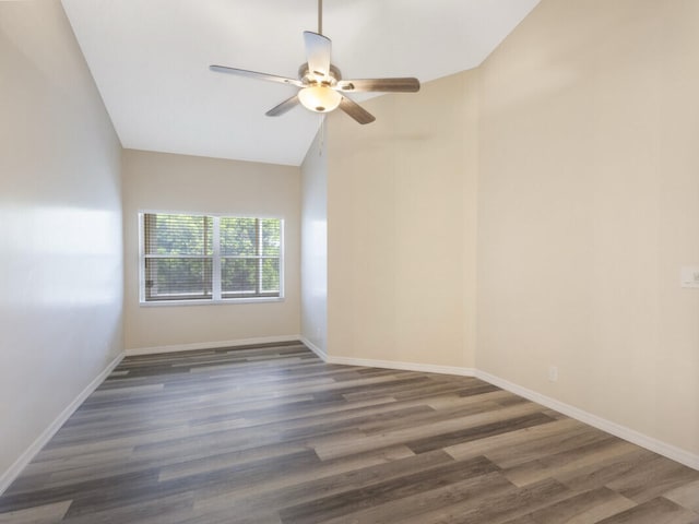 6166 Lake Hibiscus Dr, Delray Beach, FL 33484 - spare room featuring a ceiling fan, wood finished floors, lofted ceiling, and baseboards