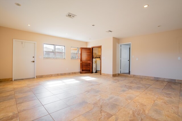 empty room featuring washer / dryer