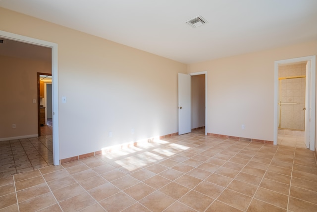 view of tiled empty room