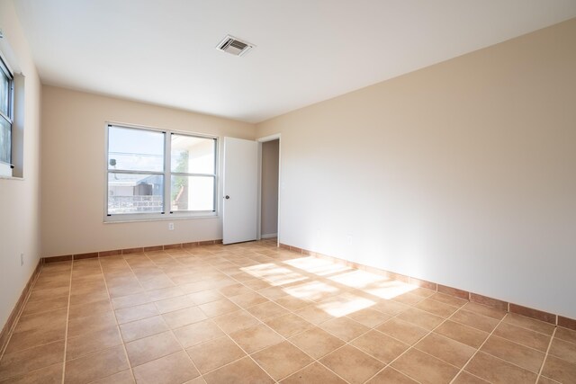 view of tiled empty room