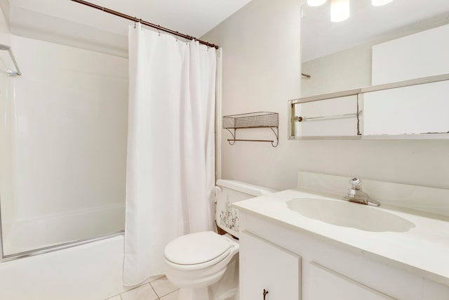 full bathroom featuring shower / bath combo, toilet, tile patterned floors, and vanity