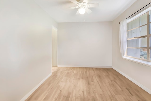 unfurnished room featuring ceiling fan and light hardwood / wood-style flooring