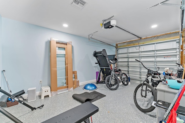 garage featuring a garage door opener