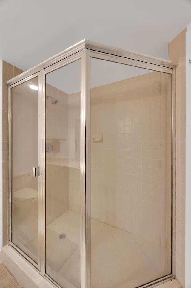 full bathroom with a stall shower