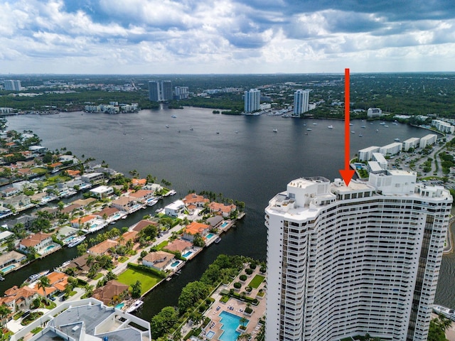 aerial view featuring a view of city and a water view