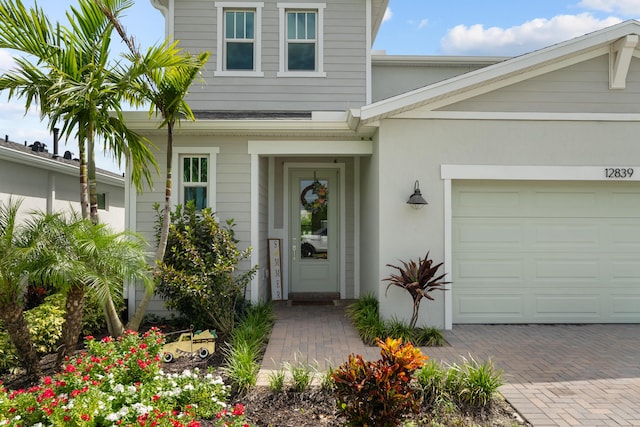 property entrance with a garage