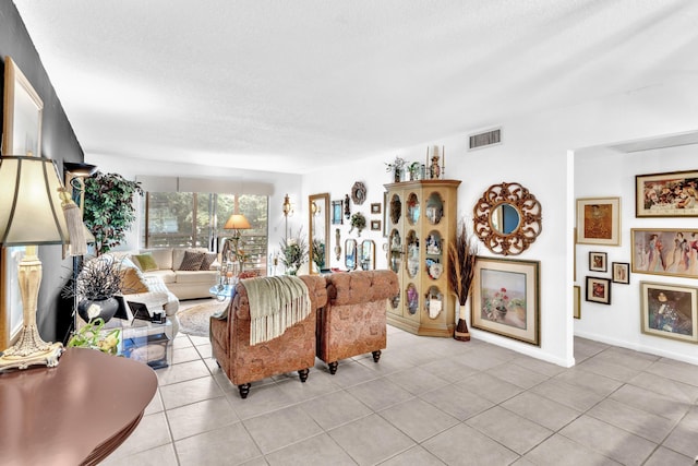 living room featuring light tile patterned floors