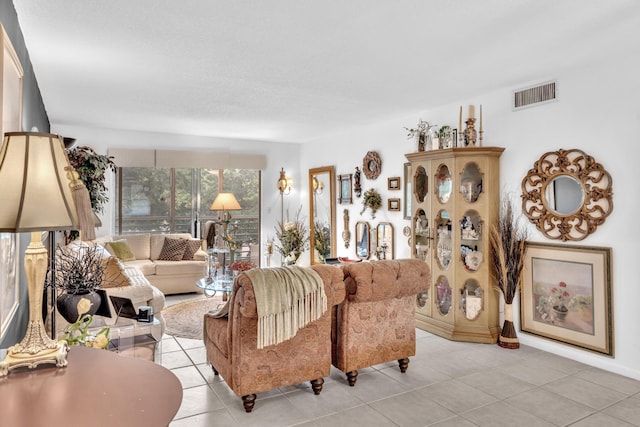 living room featuring light tile patterned flooring