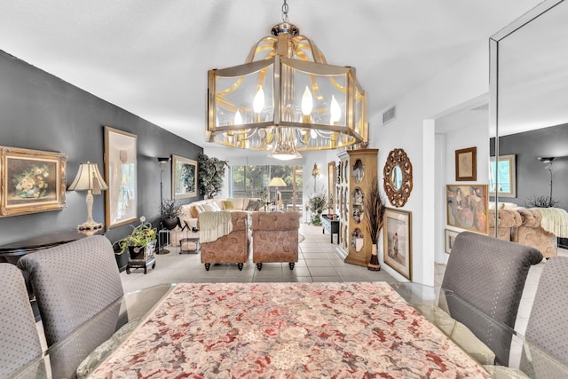 tiled dining space with a notable chandelier