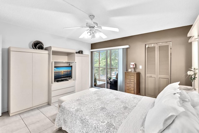 bedroom with access to outside, light tile patterned flooring, and ceiling fan