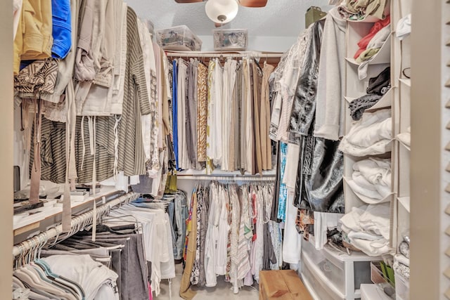 spacious closet with ceiling fan