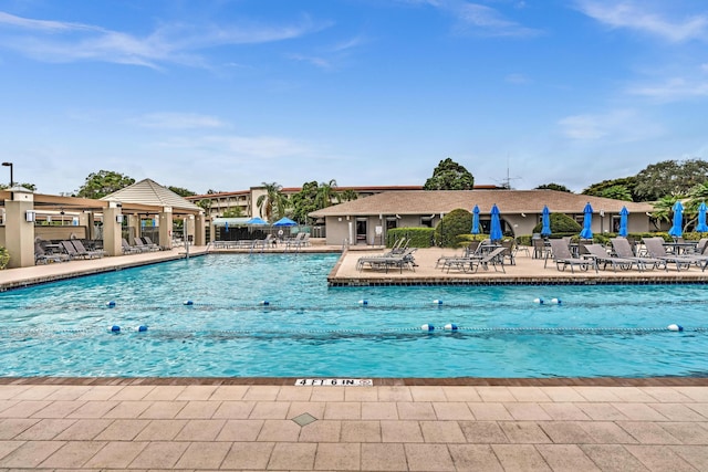 view of swimming pool featuring a gazebo