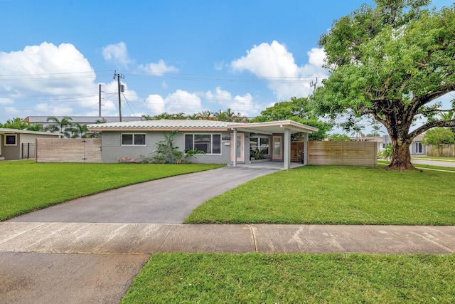 ranch-style house with a front yard