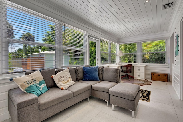 sunroom featuring wooden ceiling