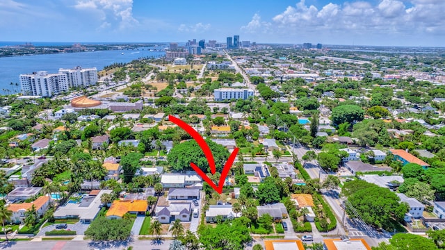 birds eye view of property featuring a water view