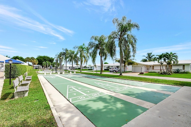 view of community featuring a lawn