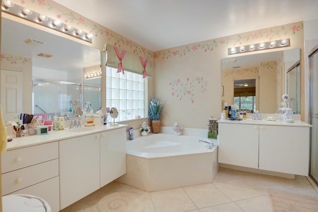 bathroom with vanity, tile patterned floors, and independent shower and bath