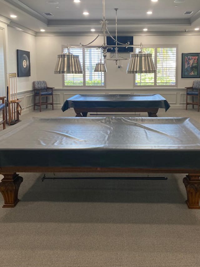 game room with a tray ceiling, carpet flooring, and pool table