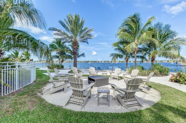 view of patio with a water view