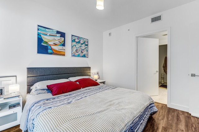 bedroom featuring hardwood / wood-style flooring